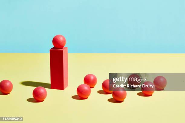 conceptual image of geometric blocks - red pedestal stock pictures, royalty-free photos & images