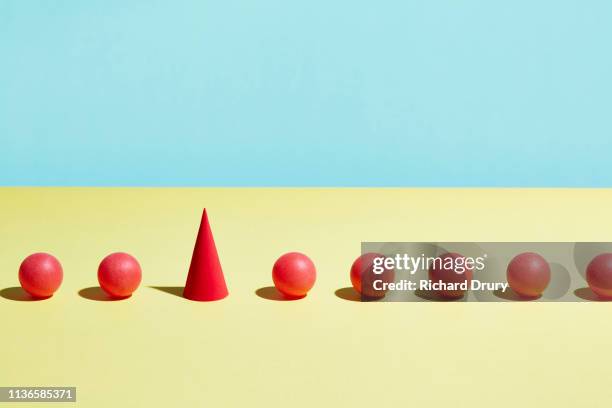 conceptual image of geometric blocks - kegel stockfoto's en -beelden