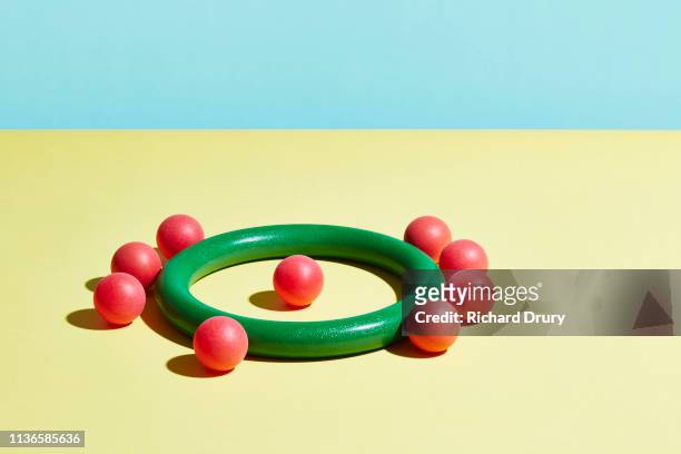 conceptual image of geometric blocks - hula hoop studio stock pictures, royalty-free photos & images