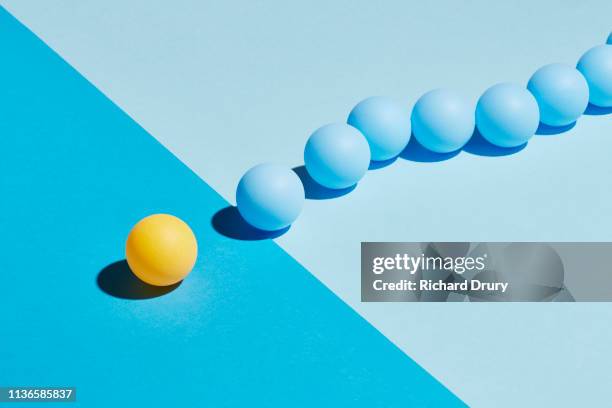 conceptual image of spheres - conformidad fotografías e imágenes de stock