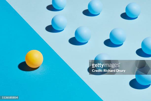 conceptual image of spheres - estranged imagens e fotografias de stock