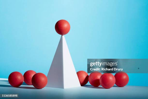 conceptual image of geometric blocks - pyramid shape 3d stock pictures, royalty-free photos & images