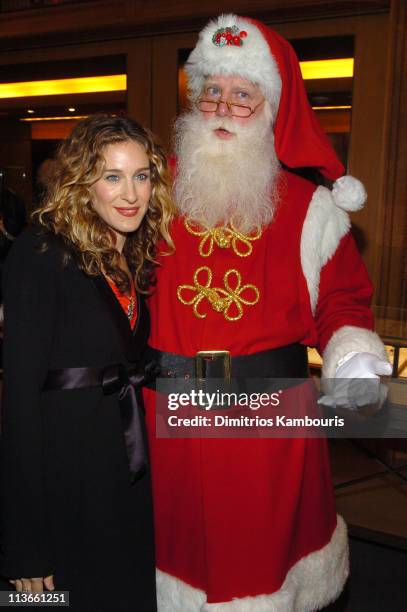 Sarah Jessica Parker and Santa Claus during Lighting of Panthers Gracing The Cartier Mansion and Unveiling of Legendary Duke and Duchess of Windsor...