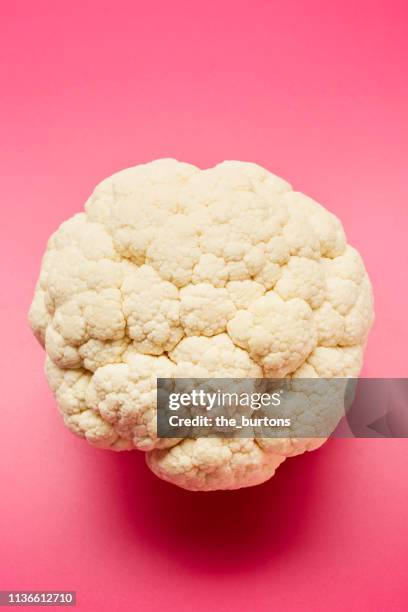 still life of cauliflower on pink background - cauliflower stock pictures, royalty-free photos & images
