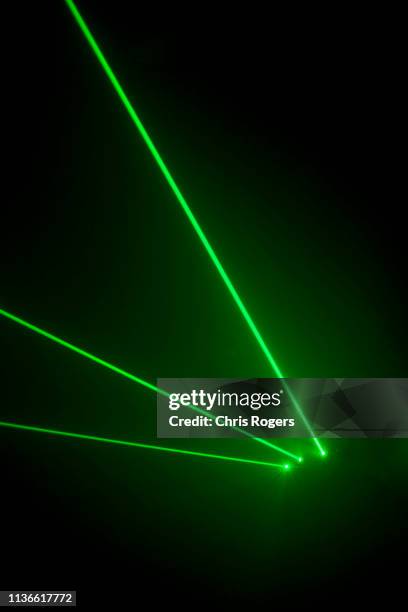 laser orbs - láser fotografías e imágenes de stock