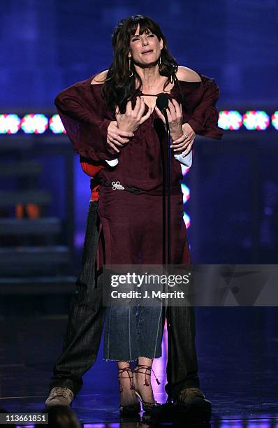 Jimmy Fallon and Sandra Bullock during 2005 MTV Movie Awards - Show at Shrine Auditorium in Los Angeles, California, United States.