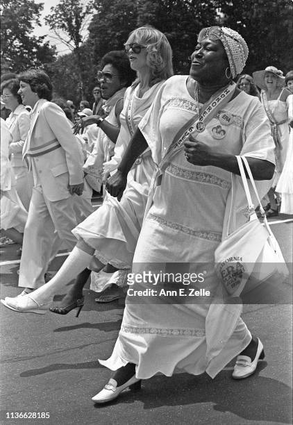 American actress Esther Rolle sings and claps during the Equal Rights Amendment March, Washington DC, July 9, 1978. Among those visible in the...