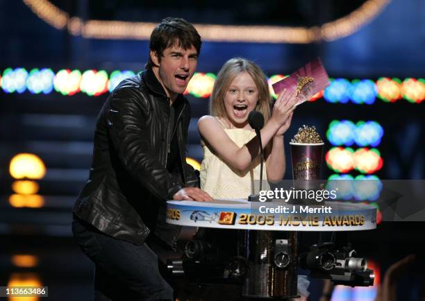 Tom Cruise and Dakota Fanning during 2005 MTV Movie Awards - Show at Shrine Auditorium in Los Angeles, California, United States.