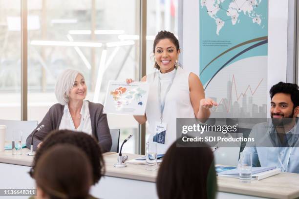 international businesswoman speaks on panel of experts - panel discussion stock pictures, royalty-free photos & images