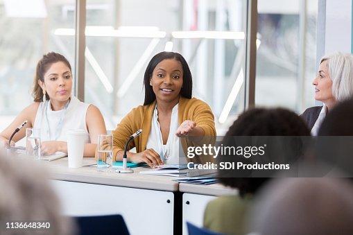 Discussion Poses Businesswoman Gestures During Panel Discussion High-Res Stock Photo ...