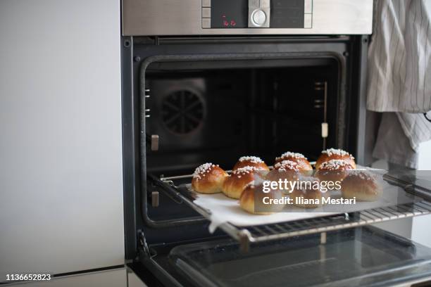 mini brioches coming out of the oven - brioche stock pictures, royalty-free photos & images