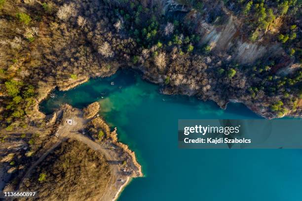 closed quarry lake from arial view - hungary landscape stock pictures, royalty-free photos & images