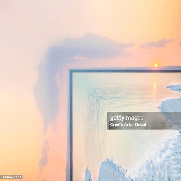 surreal bent landscape of the dead sea during sunset with stunning colors. - höhenangst stock-fotos und bilder