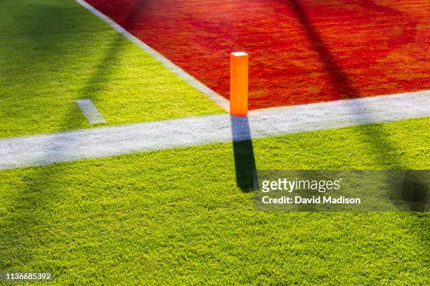 goal line end markers on american football field - touchdown endzone stock pictures, royalty-free photos & images