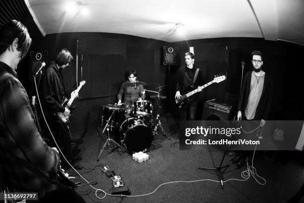 band making music - punk music stock pictures, royalty-free photos & images