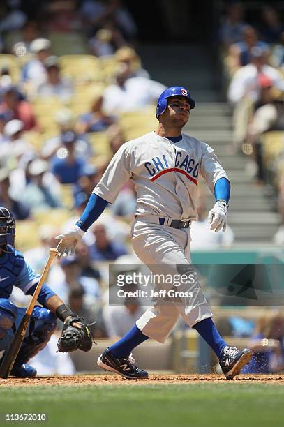 Carlos Pena of the Chicago Cubs hits a solo home run in the sixth inning against the Los Angeles Dodgers at Dodger Stadium on May 4, 2011 in Los...