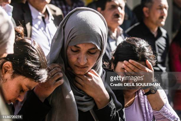 This picture taken on April 13, 2019 at the Syrian Kurdish-run group Yazidi House's headquarters in the Syrian Yazidi village of Qizlajokh, about 35...