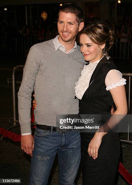 Alicia Silverstone, right and husband Chris Jarecki