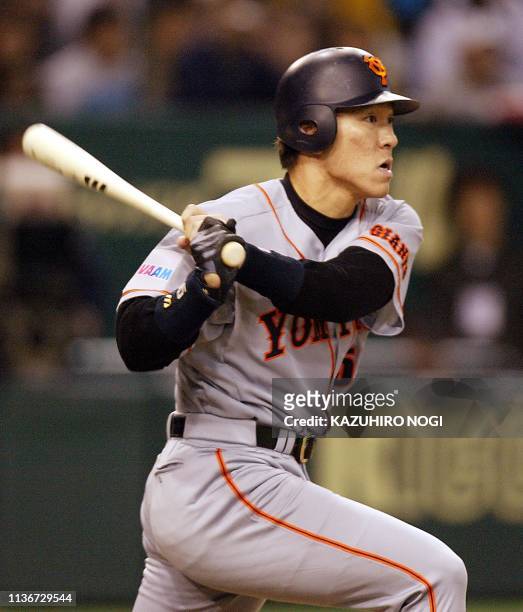 Japanese slugger Hideki Matsui of the Tokyo Yomiuri Giants follows after a two-base hit during a game between Japanese baseball squad and the Major...
