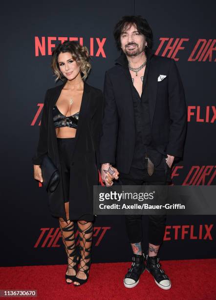 Tommy Lee and Brittany Furlan arrive at the premiere of Netflix's 'The Dirt' at ArcLight Hollywood on March 18, 2019 in Hollywood, California.