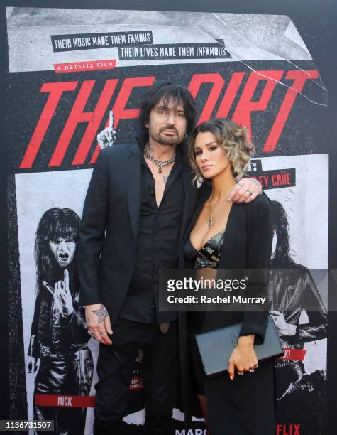 Tommy Lee and Brittany Furlan attend the premiere of Netflix's 'The Dirt" at the Arclight Hollywood on March 18, 2019 in Hollywood, California.
