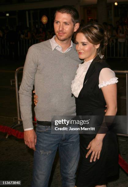 Alicia Silverstone, right and husband Chris Jarecki