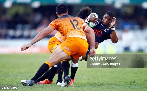 Tomas Lezana of the Jaguares tackling Grant Williams of the Cell C Sharks during the Super Rugby match between Cell C Sharks and Jaguares at Jonsson...