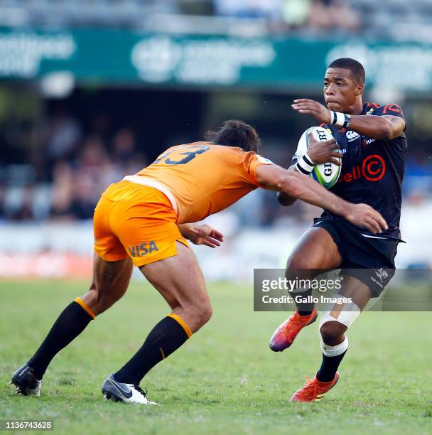 Matias Orlando of the Jaguares tackling Grant Williams of the Cell C Sharks during the Super Rugby match between Cell C Sharks and Jaguares at...