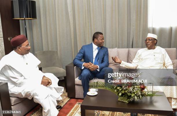 Niger's President Mahamadou Issoufou , Togo's President Faure Gnassingbe and Chad's President Idriss Deby meet before the opening ceremony of a Heads...