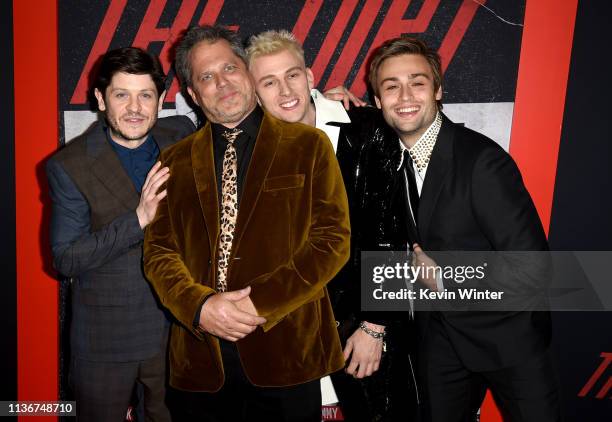 Iwan Rheon, Jeff Tremaine, Colson Baker and Douglas Booth arrive at the premiere of Netflix's "The Dirt" at ArcLight Hollywood on March 18, 2019 in...