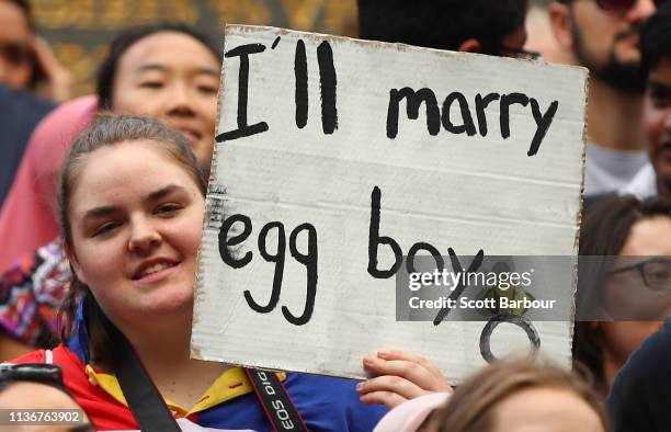 Protesters hold placards aloft as they march during the Stand Against Racism and Islamophobia: Fraser Anning Resign! rally on March 19, 2019 in...