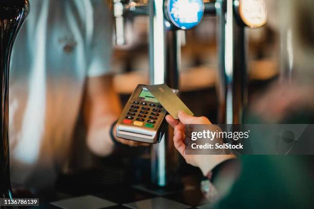 contactless payment method - paying restaurant stock pictures, royalty-free photos & images