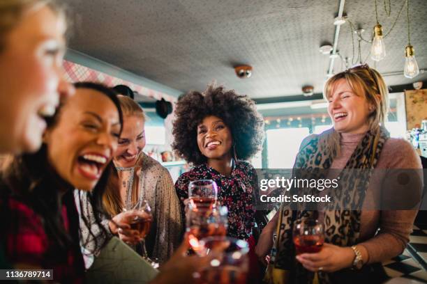 social gathering at bar - leaving work stock pictures, royalty-free photos & images