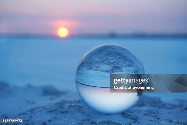 crystal ball,sunset - harbin winter - fotografias e filmes do acervo