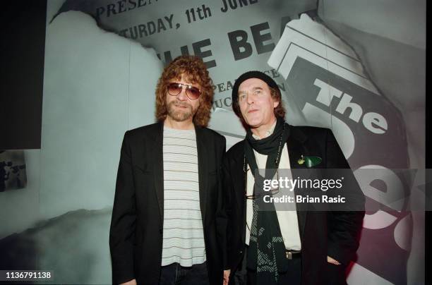 English musician and producer Jeff Lynne pictured on left with Beatles Apple Corps executive Neil Aspinall at the launch of the Beatles Anthology 1...