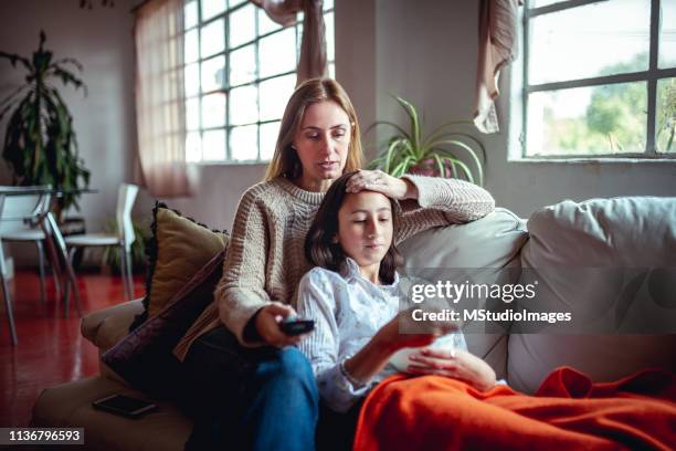 mother and daughter at home. - teenagers eating with mum stock pictures, royalty-free photos & images