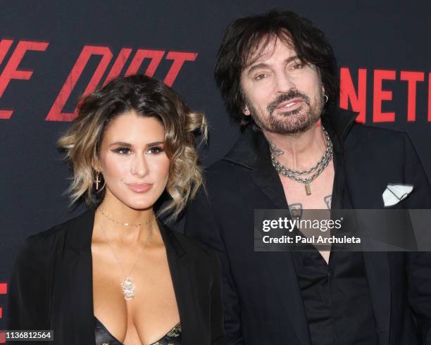 Tommy Lee and his Wife Brittany Furlan attend the Premiere Of Netflix's "The Dirt" at ArcLight Hollywood on March 18, 2019 in Hollywood, California.