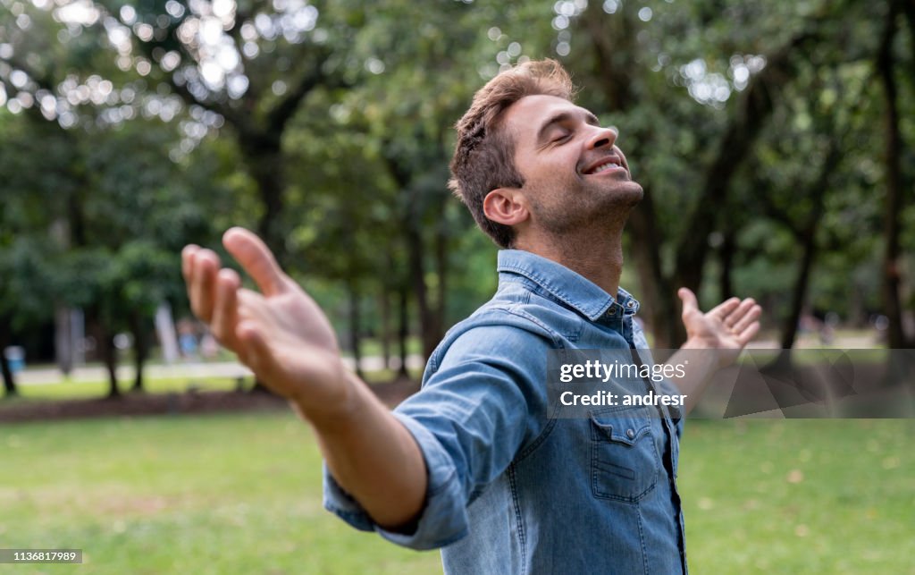 Peaceful man relaxing at the park