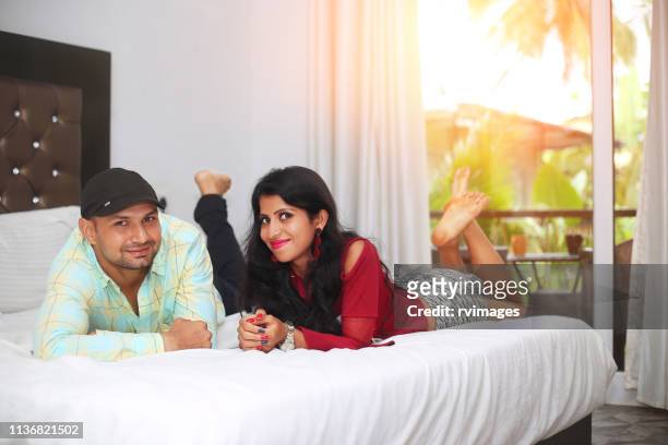 couples in studio apartment - goa resort stock pictures, royalty-free photos & images