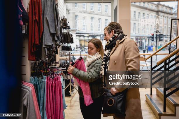 mother and daughter shopping - disability collection stock pictures, royalty-free photos & images