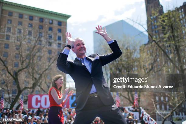 New Jersey Governor Phil Murphy exits the stage after speaking to supportres during a campaign event for Sen. Cory Booker and 2020 presidential...