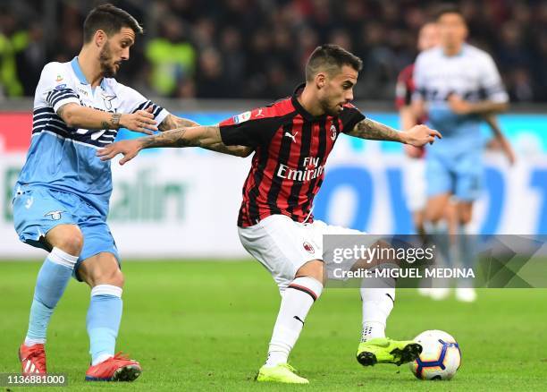 Milan's Spanish forward Suso controls the ball during the Italian Serie A football match AC Milan vs Lazio Rome on April 13, 2019 at the San Siro...