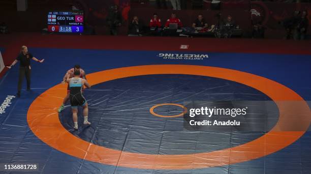 Riza Kayaalp of Turkey in action against Iakobi Kajaja of Georgia during men's 130kg greco roman category within the 2019 European Wrestling...