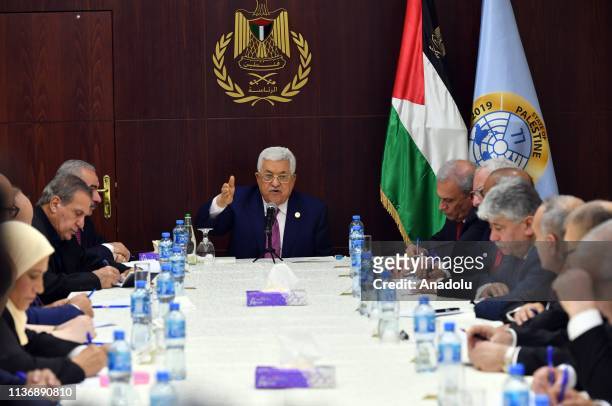 Palestinian President Mahmoud Abbas holds the first cabinet meeting with the newly announced government at the Presidential Office in Ramallah, West...