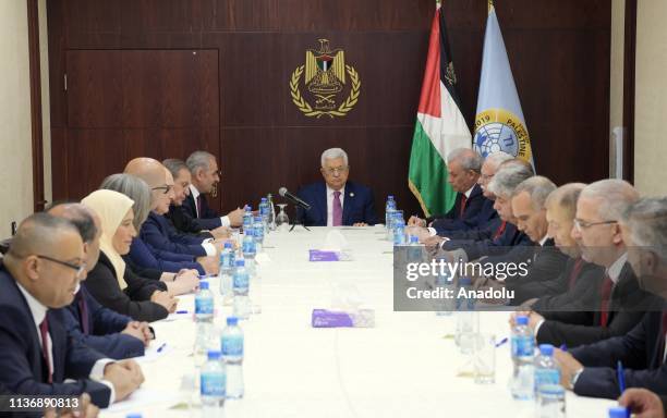 Palestinian President Mahmoud Abbas holds the first cabinet meeting with the newly announced government at the Presidential Office in Ramallah, West...