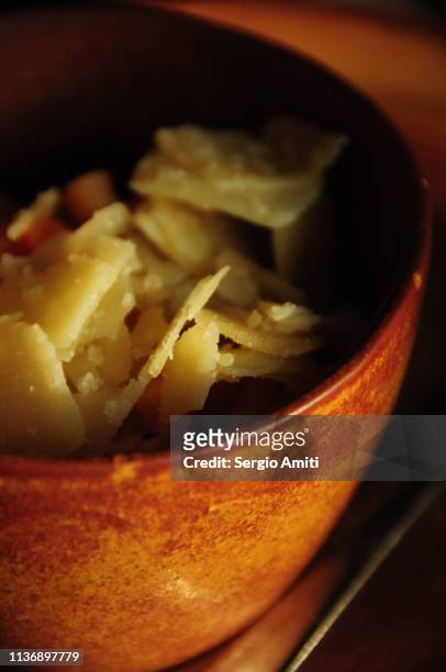 shaved parmesan in a bowl - shaved cheese stock pictures, royalty-free photos & images