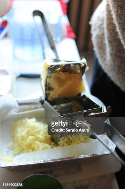 potato ricer with mashed potatoes - potato masher bildbanksfoton och bilder