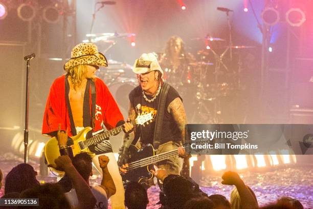 March 19, 2019]: Vince Neil and Nikki Sixx of Motley Crue perform on July 15,1999 in New York City.