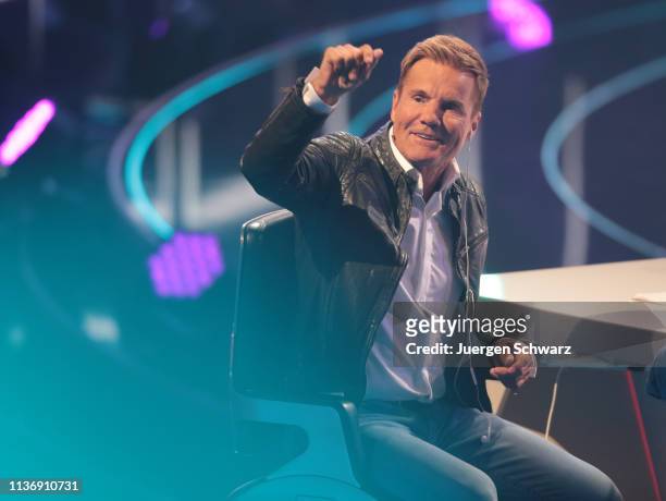 Dieter Bohlen lifts his arm during the second event show of the tv competition "Deutschland sucht den Superstar" at Coloneum on April 13, 2019 in...