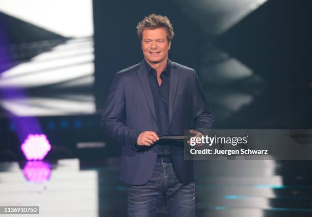 Oliver Geissen looks on during the second event show of the tv competition "Deutschland sucht den Superstar" at Coloneum on April 13, 2019 in...